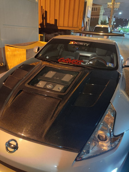 Nissan 370Z Nismo Sport Touring Base Fairlady Z Z34 2009-2020 with Aftermarket Parts - V1 Glass Clearview Style Hood Bonnet Carbon Fiber / FRP from CMST Tuning
