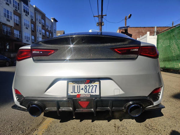 Infiniti Q60 Red Sport 400 Premium Luxe Sport Pure 2017-2022 with Aftermarket Parts - Rear Diffuser & Canards Carbon Fiber from CMST Tuning
